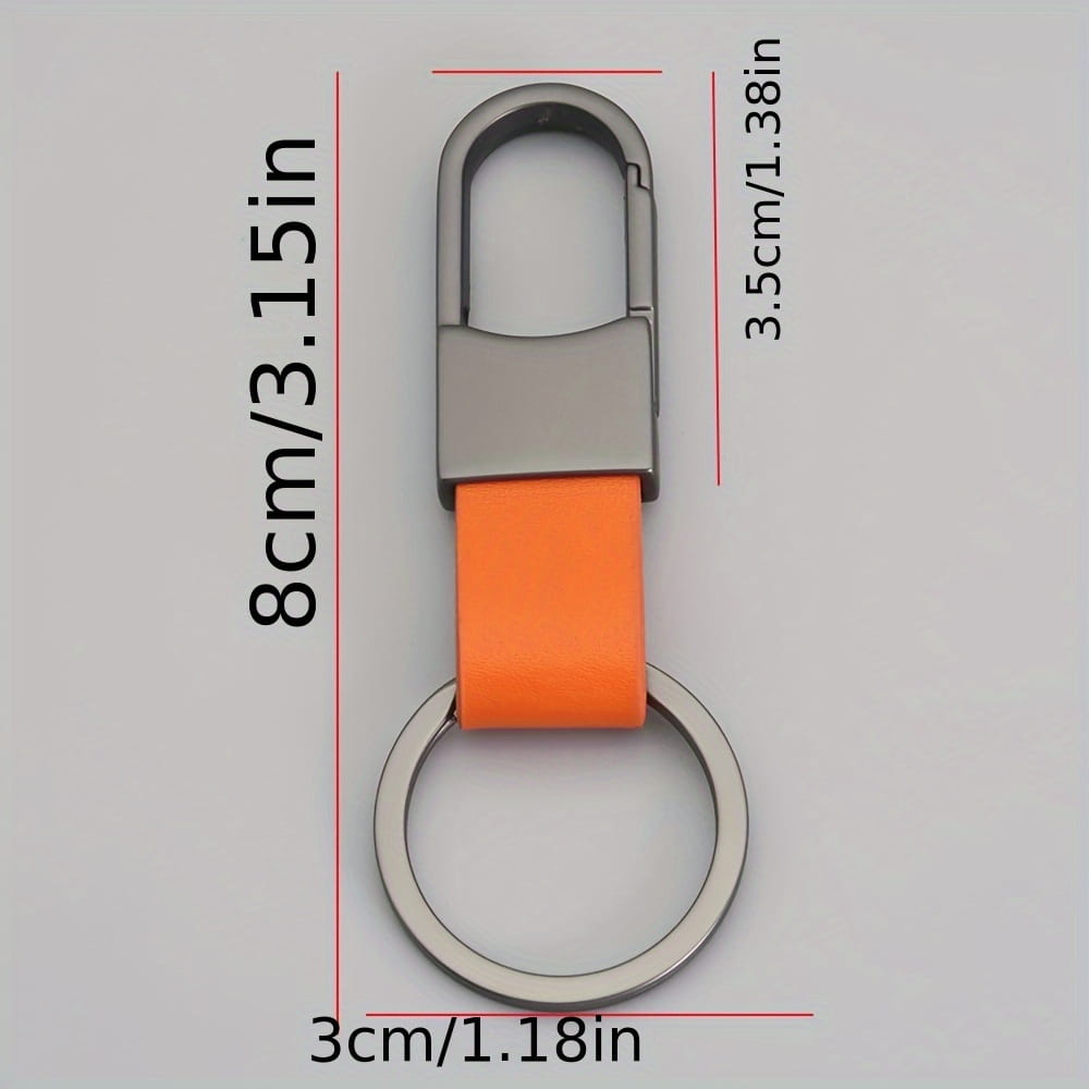 Bright orange leather strap attached to a silver-toned metal clip key ring in a colorful leather car keychain minimalist metal key ring.