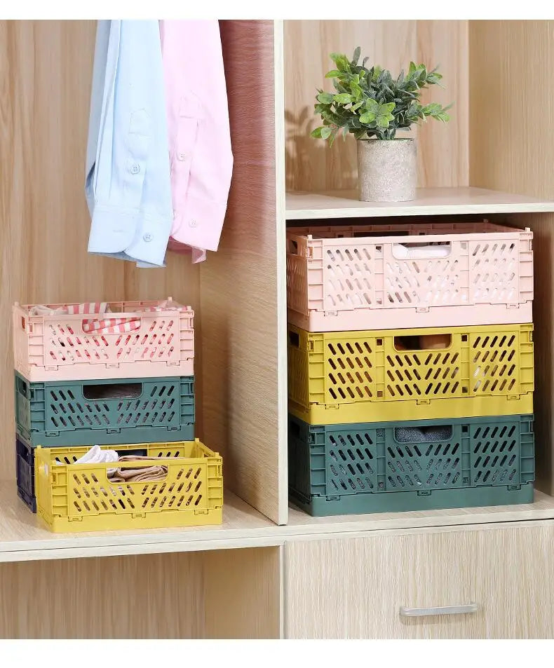 Stacked pastel-colored pink yellow and teal plastic foldable storage baskets with lattice design for versatile foldable storage solutions.