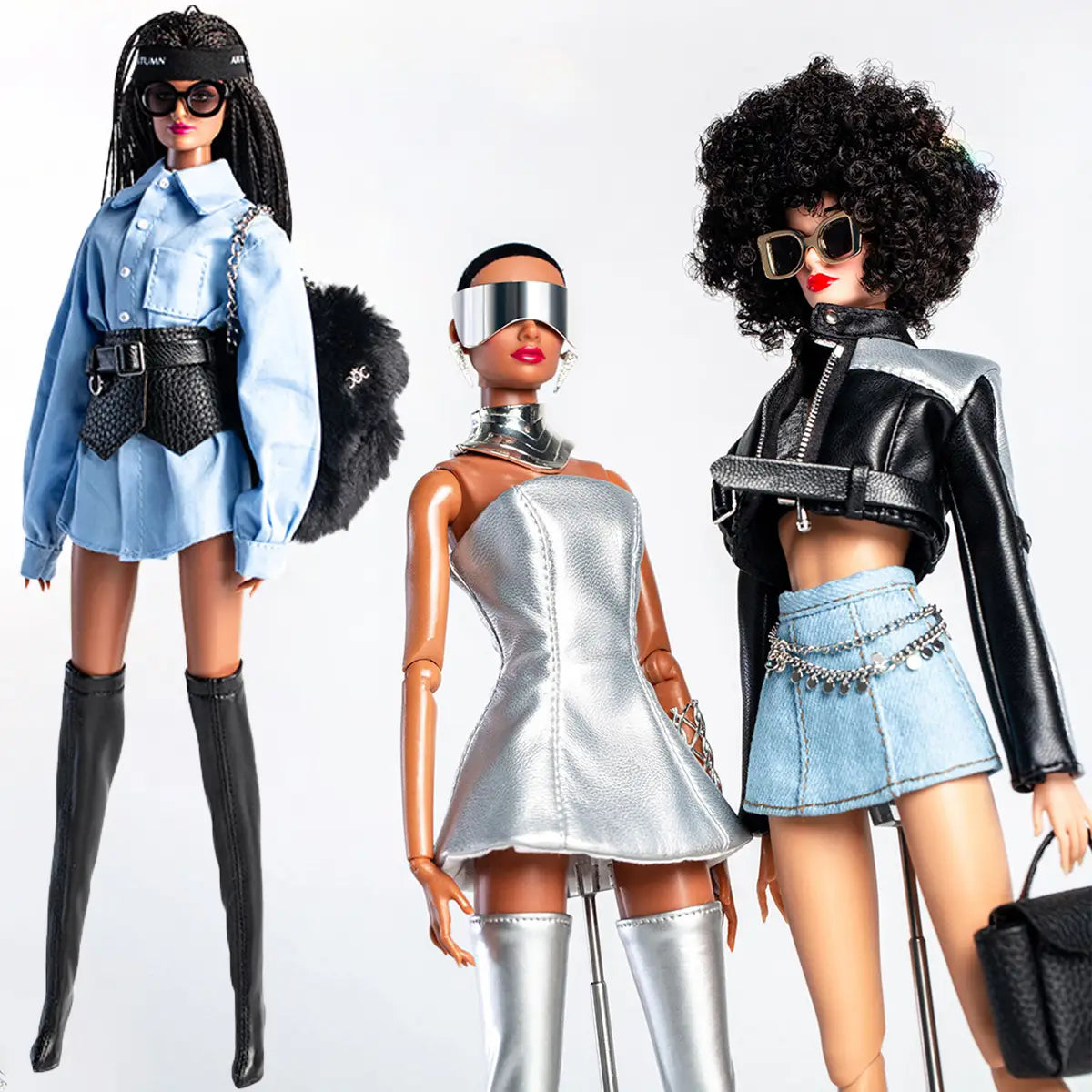 Three fashion-forward barbie dolls wearing futuristic retro doll outfits for 30cm 1/6 models featuring a silver metallic dress and a black leather jacket.