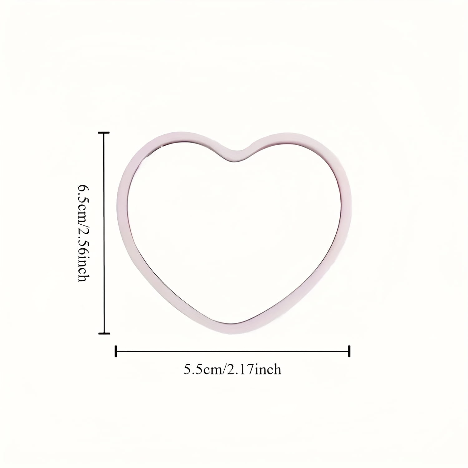 a delicate light pink heart-shaped cookie cutter with smooth edges and a slightly raised rim included in a 36pcs 12sets bridal shower favors set featuring pink heart mirrors thank you cards and tulle bags for bridesmaid and wedding favors