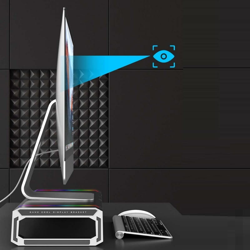 Moniteur de jeu à cadre argent avec design minimaliste épuré et bordure fine, présenté sur un support de moniteur RGB avec station d’accueil USB et tiroir de rangement.