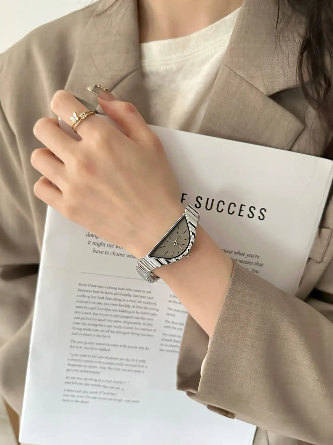 Silver-toned Geometric Triangle Quartz watch with a minimalist rectangular design, dark gray face, and stainless steel material.