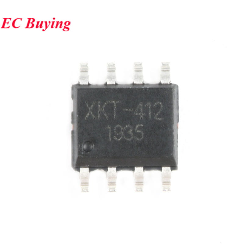 Black plastic integrated circuit with eight white pins and stamped markings xkt-412 and 1335 on the wireless charging module 5v 12v power supply circuit board.