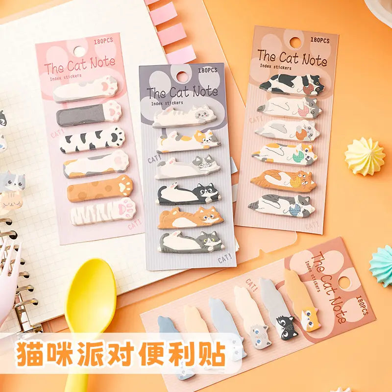 キャットメモパッド＆付箋セットは、ブラック＆ホワイト、オレンジのトラ柄、グレーに白いアクセントの、愛らしい猫のデザインのノートインデックスシールを特徴としています。