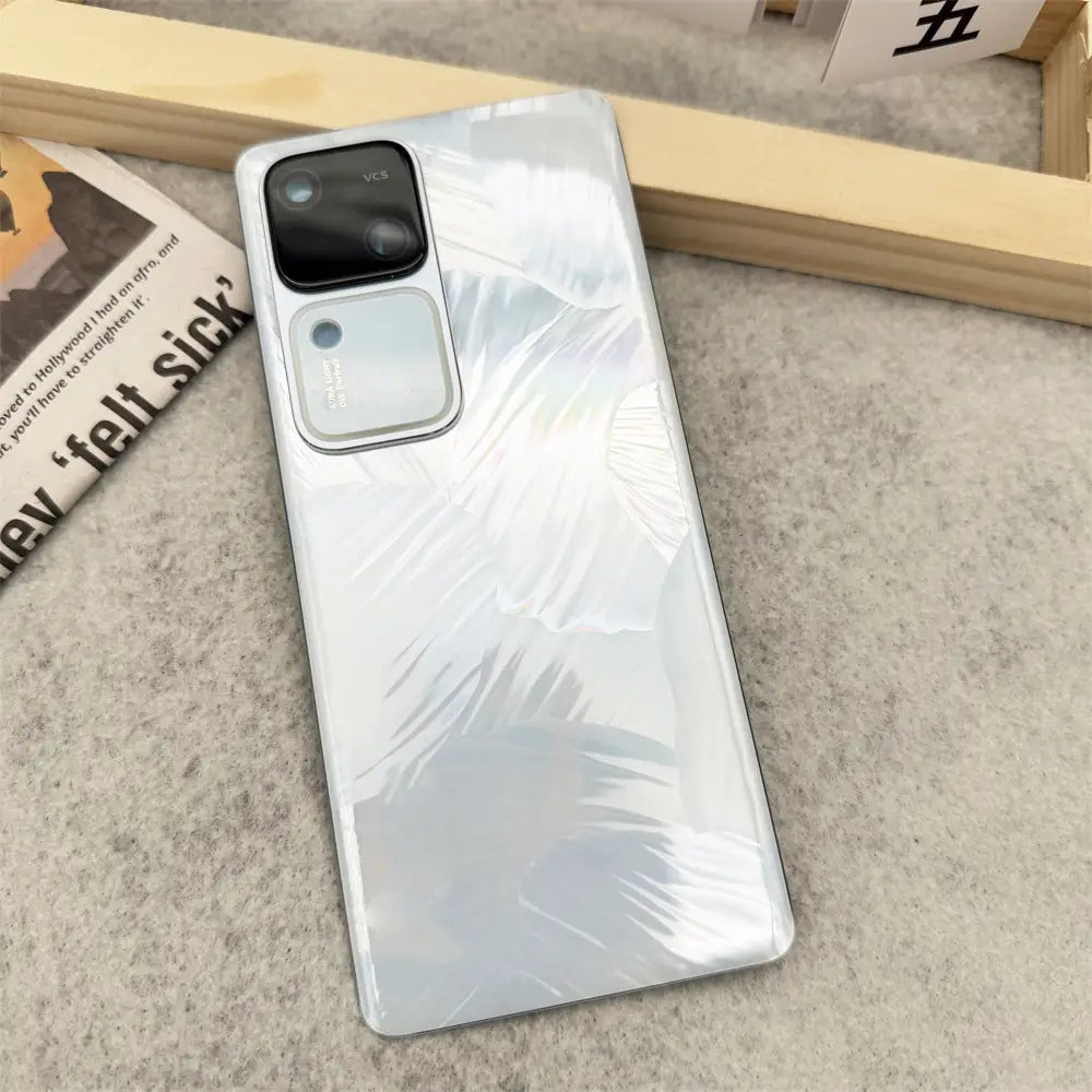 a sleek silver-gradient vivo v30 v30pro smartphone back side featuring a glossy glass back cover replacement lens with an elegant multi-lens camera module