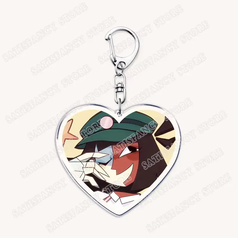 Anime-Herz-Acryl-Schlüsselanhänger mit herzförmigem Design und Cartoon-Charakter mit dunklem Haar, grüner Mütze und rotem Gesicht, ideal als Geschenk für Gamer.