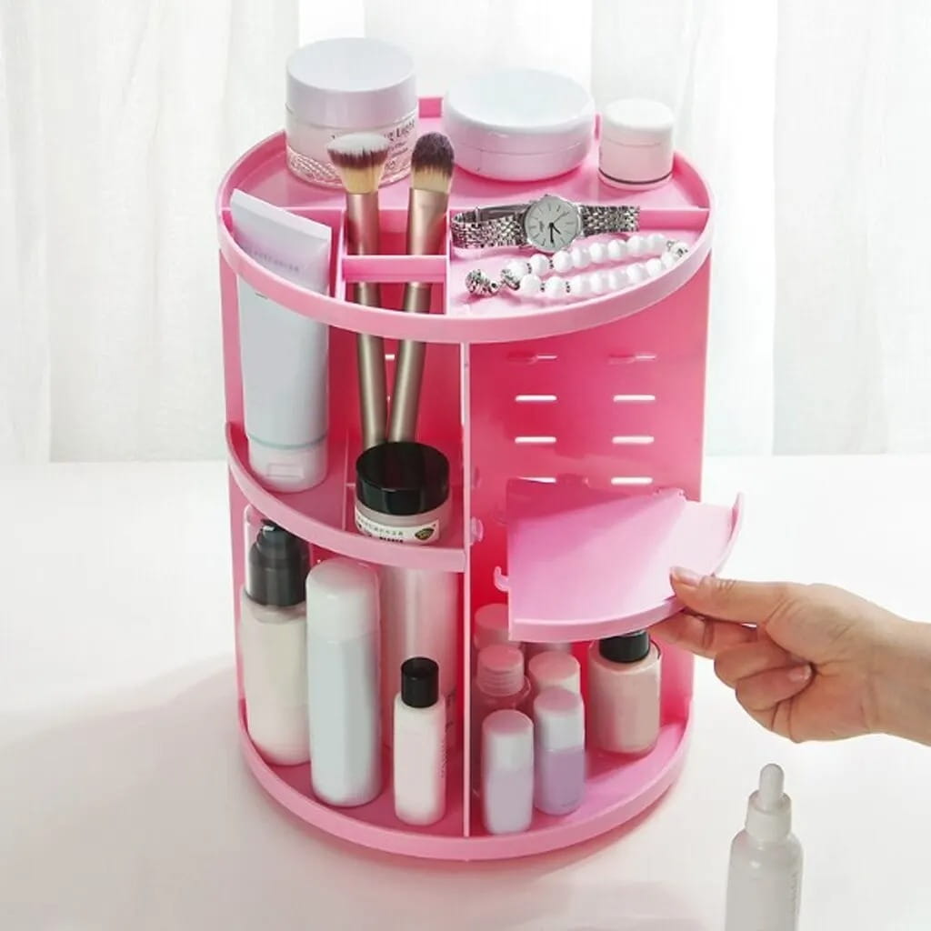 Organisateur de maquillage tournant en plastique rose à plusieurs niveaux, avec compartiments et tiroir coulissant, pour un stockage cosmétique à 360 degrés