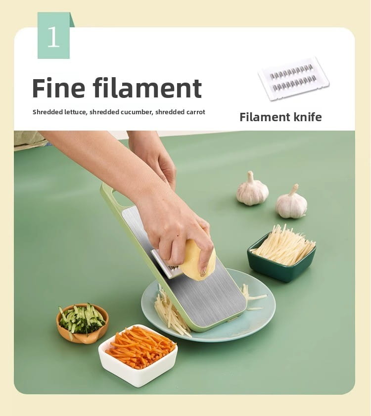 Green-handled multi-functional stainless steel vegetable slicer shredder filament knife designed for shredding vegetables into fine strands.