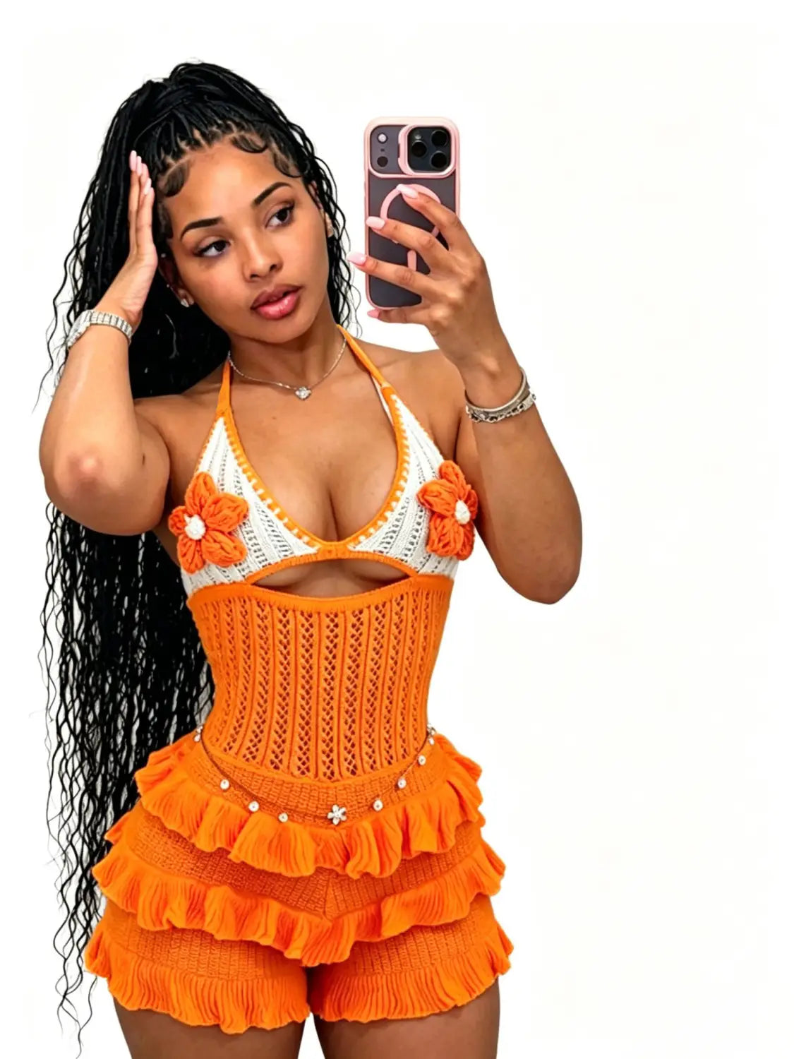 orange and white crocheted knitted ruffle halter romper summer playsuit with floral embellishments and ruffled shorts