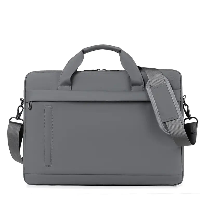 Sacoche professionnelle pour ordinateur portable en attaché/porte-documents noire en gris, avec un design structuré comprenant une poignée supérieure et une bandoulière réglable.