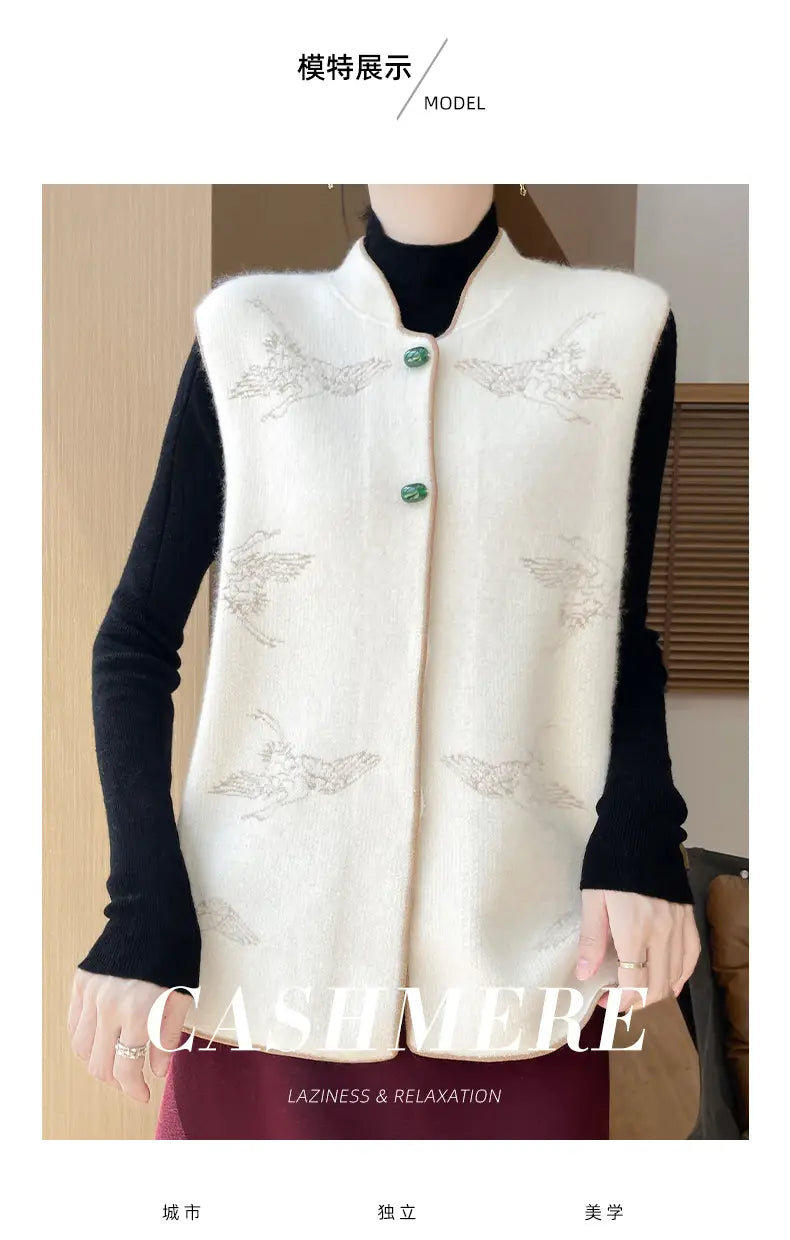 Cream-colored wool embroidered vest for women featuring delicate silver embroidery of flying birds and three matching green buttons.