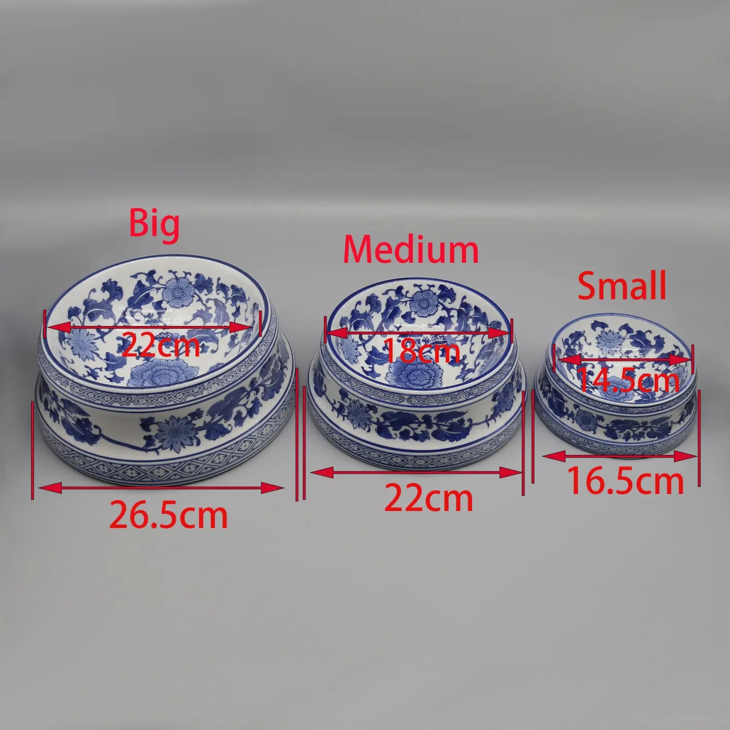 Three blue and white feeding bowl ceramic set in porcelain with traditional floral patterns in big medium and small sizes.