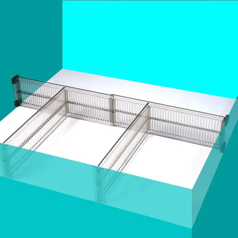 Silver metallic folding baby safety gate with vertical slats and black end caps shown as a drawer partition adjustable plastic storage divider.
