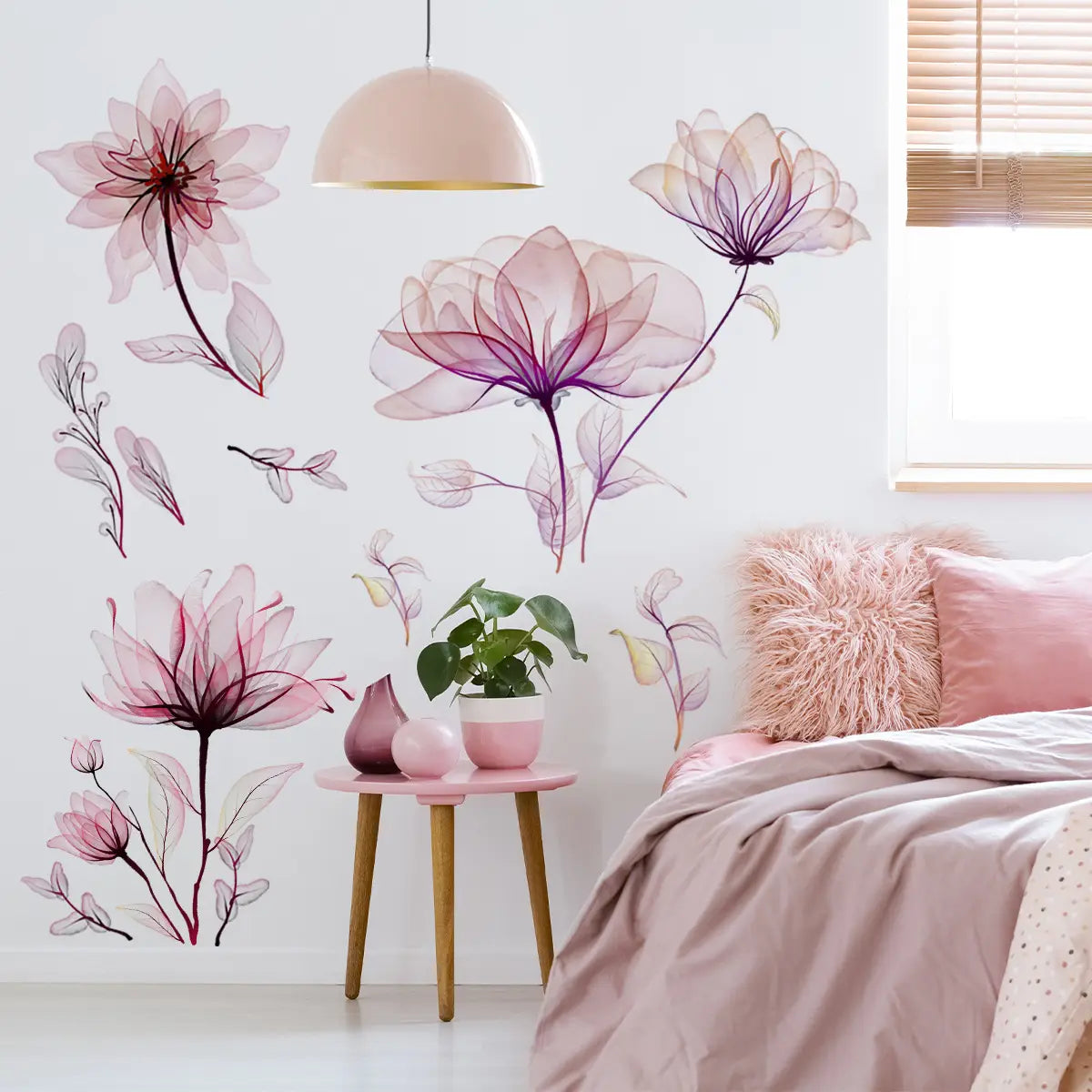 pink floral wall stickers peel and stick decals feature translucent pink and purple flowers with delicate outlines adorning a white wall.
