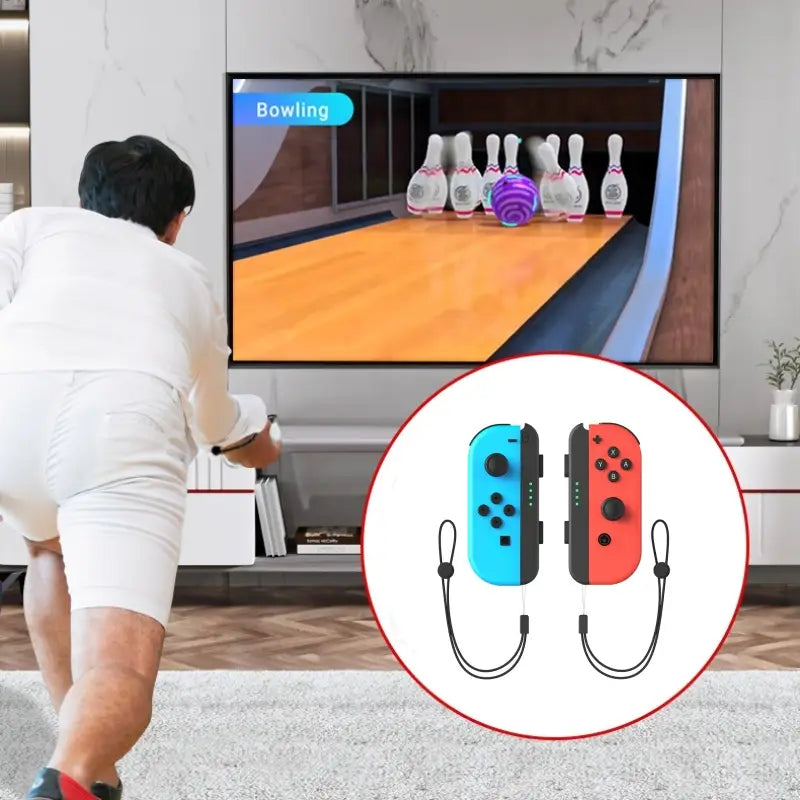 Nintendo-Switch-Greifhalter-Kit mit leuchtendblauen und kraftvoll roten Joy-Con-Controllern, jeweils ausgestattet mit einem schwarzen Handgelenkriemen für sicheres Handling.
