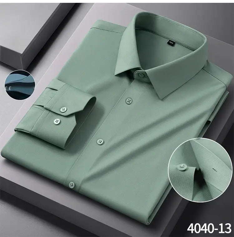 A neatly folded men’s slim fit nylon formal dress shirt in mint green with a crisp collar buttoned cuffs and subtle stitching details.