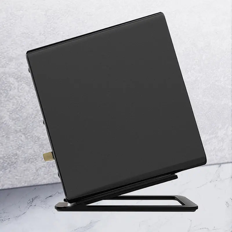 Black matte-finish aluminum desktop speaker stand pair with 16 degree tilt and gold-colored hinge detail showcasing a sleek minimalist design