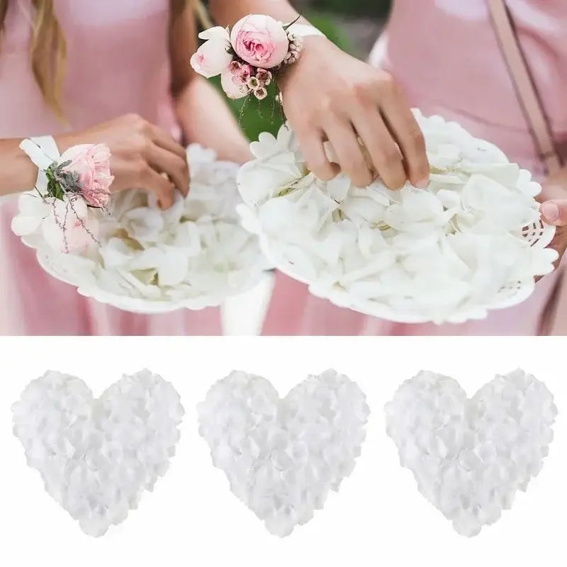 結婚式やパーティーに向けて、ハート形のコンフェッティとして示された白いシルクのバラの花びら