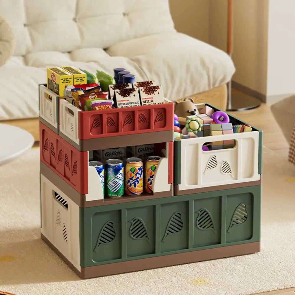 Stacked multi-colored foldable storage plastic folding crates with leaf and bird cutout designs showcasing actual goods without chromatic aberration.
