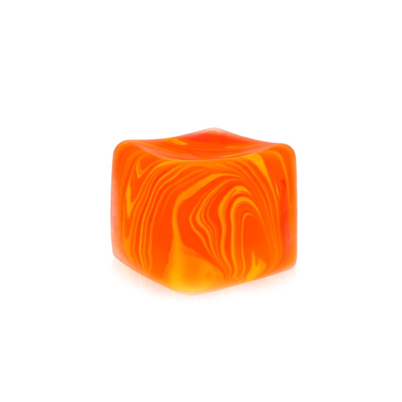 Vibrant orange and yellow marbled silicone cube squeeze toy designed as a marble swirl slow rising sensory fidget.