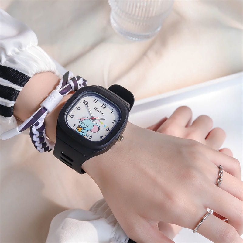 Black square-faced kids digital watch with a white dial featuring a cartoon mouse design and the brand name unzang, titled kids luminous cartoon elephant digital watch white.