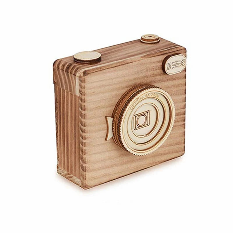 Custom photo film roll keychain in the form of a wooden camera-shaped box with a light brown finish, detailed grain patterns, and metallic accents on the lens and top knobs.