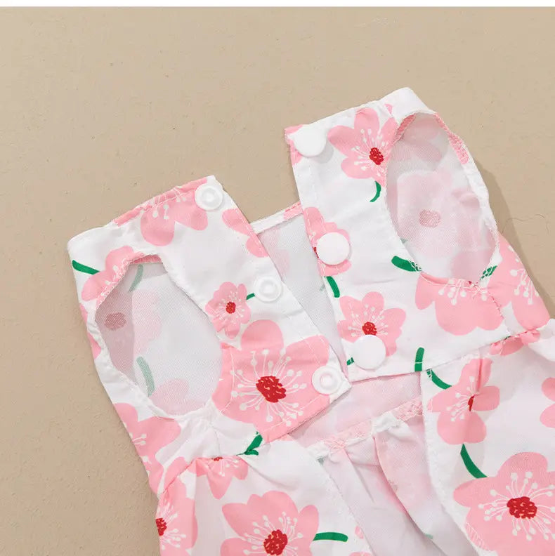 pink floral-patterned pet harness with white snap buttons and soft breathable fabric designed for the floral dog princess dress with bow