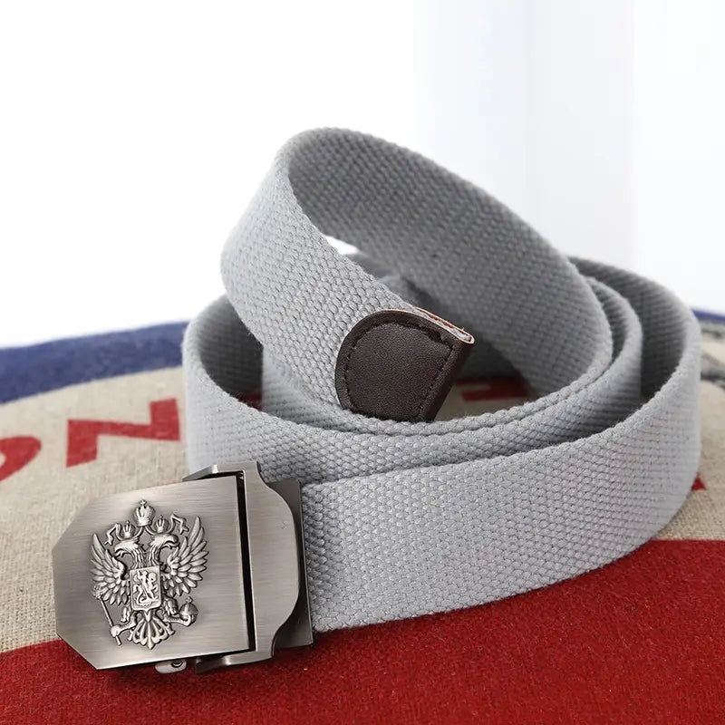 Ceinture tactique en toile grise pour hommes, avec une boucle à finition ton argent, présentant un emblème d’aigle russe bicéphale en relief.