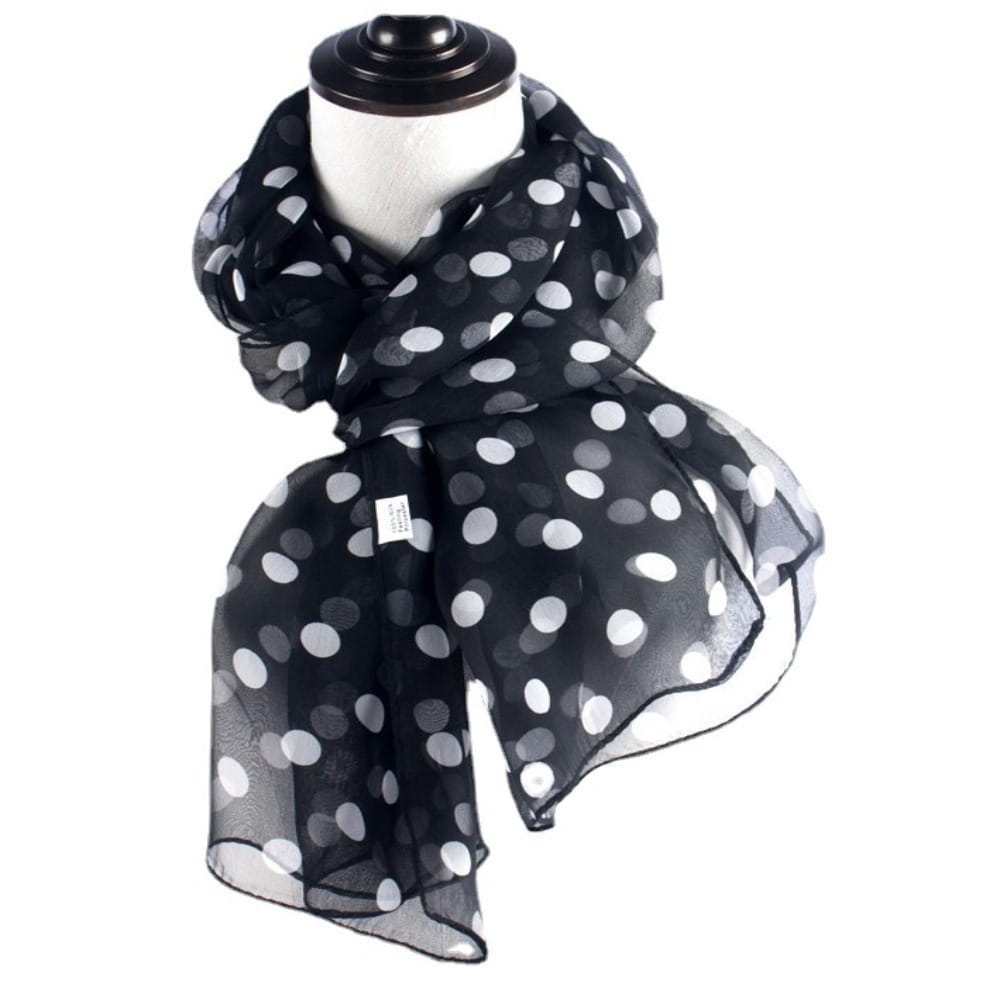 Black sheer silk polka dot head wrap scarf with white dots draped around a mannequin neck.