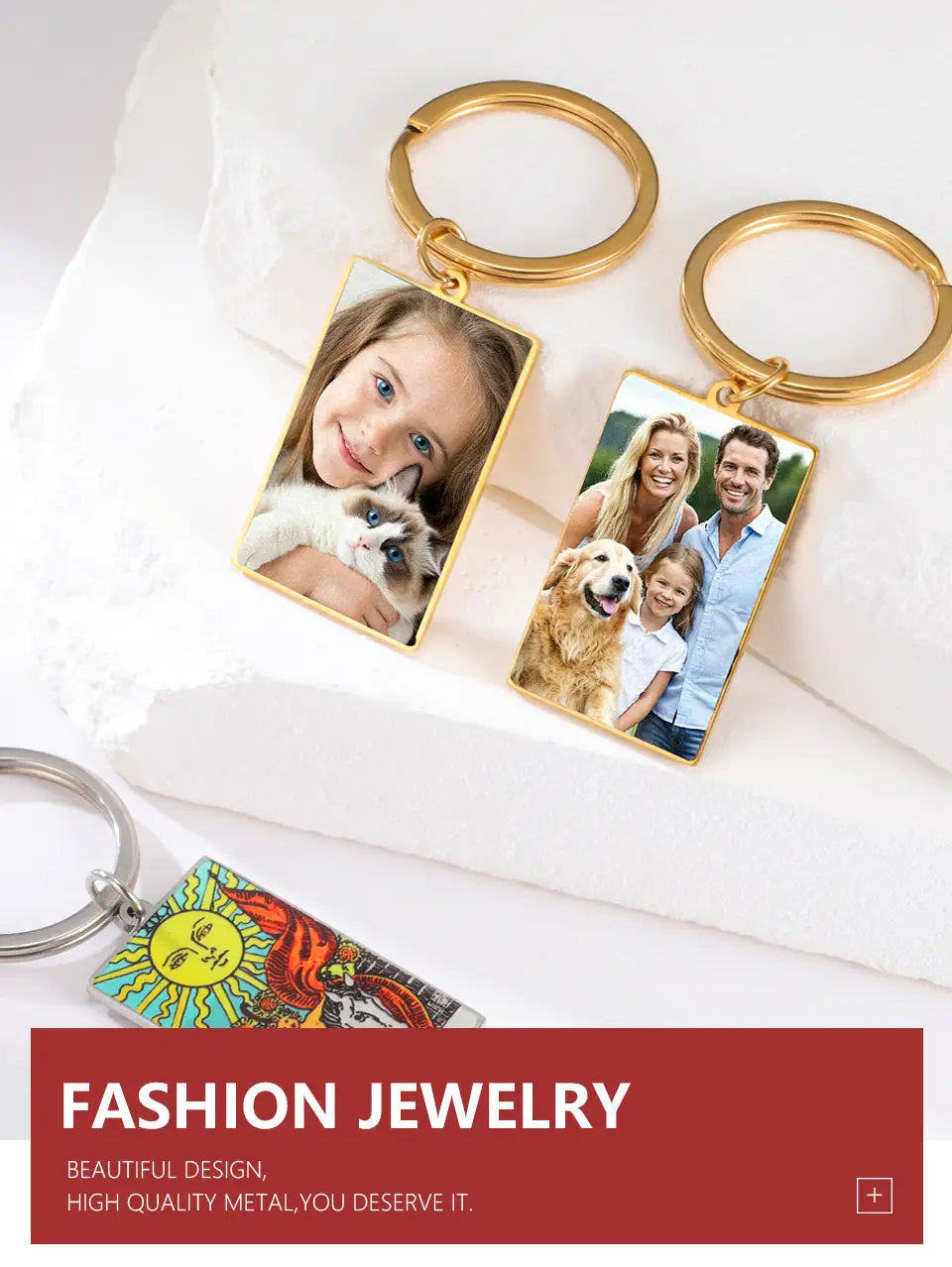 Gold-toned rectangular custom photo keychains with personalized family portraits encased in a stainless steel frame and attached to a stainless steel ring.
