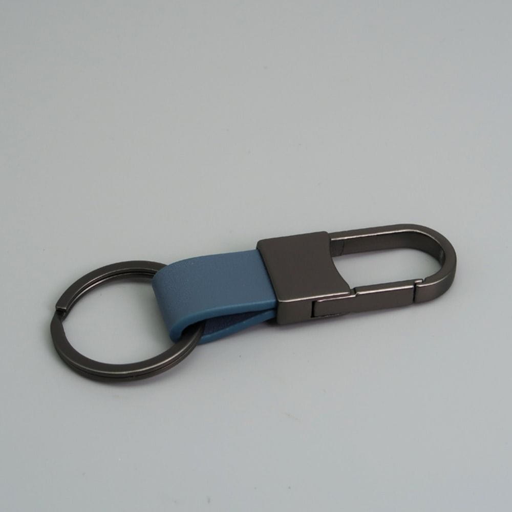 Blue leather keychain with a matte black metal carabiner and ring designed as an anti lost waist ring.