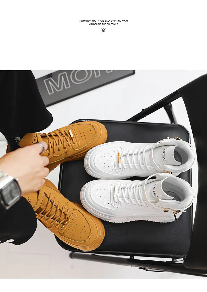 Men white high top sneakers in tan and white featuring chunky gold buckle accents on the laces and zipper pulls.
