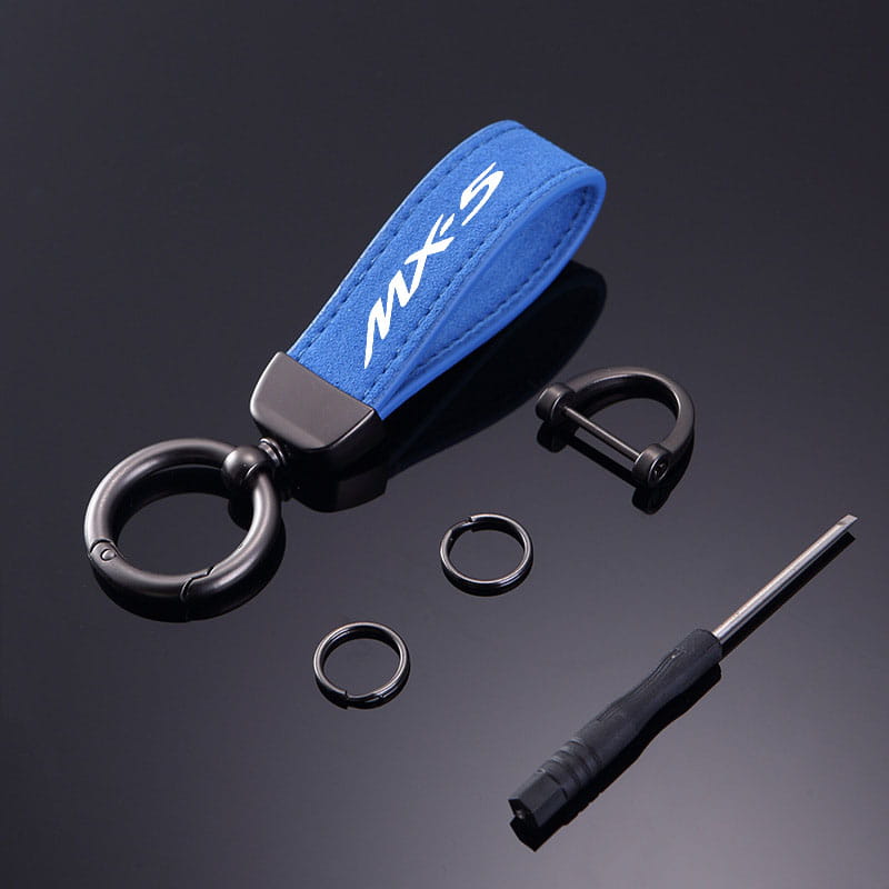 Blue suede mazda mx5 leather keychain with white mx-5 logo and black metal hardware for car key ring holder.