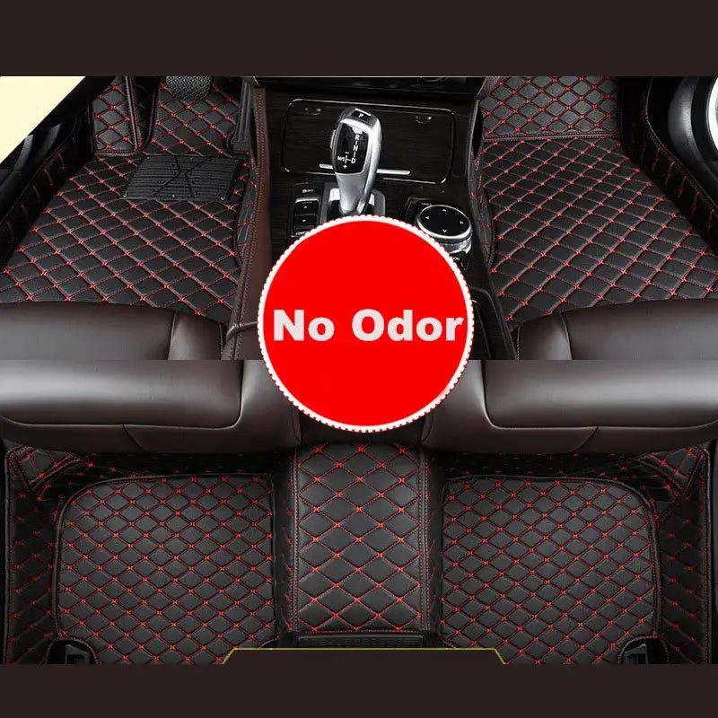 Black quilted Ssangyong Tivoli custom leather car floor mats with red stitching designed for vehicle interiors.