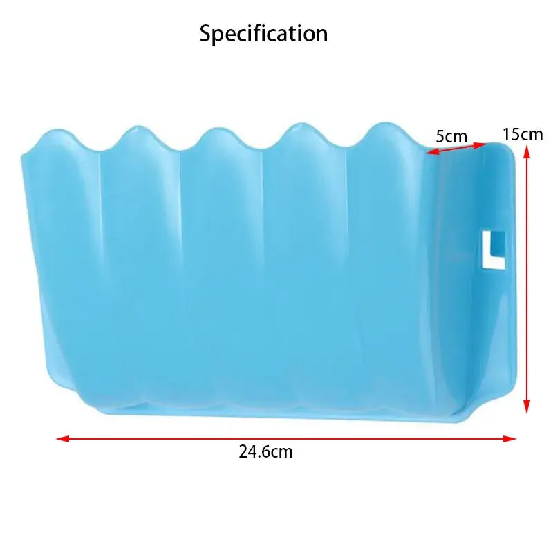 Light blue plastic external rabbit hay feeder with a wavy scalloped edge design for use as a food rack.
