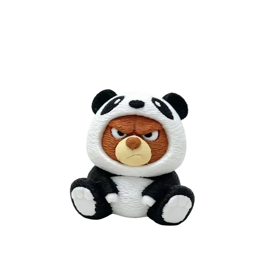 A small 3d printing bear figurine wearing a white and black panda jacket with a grumpy expression front view