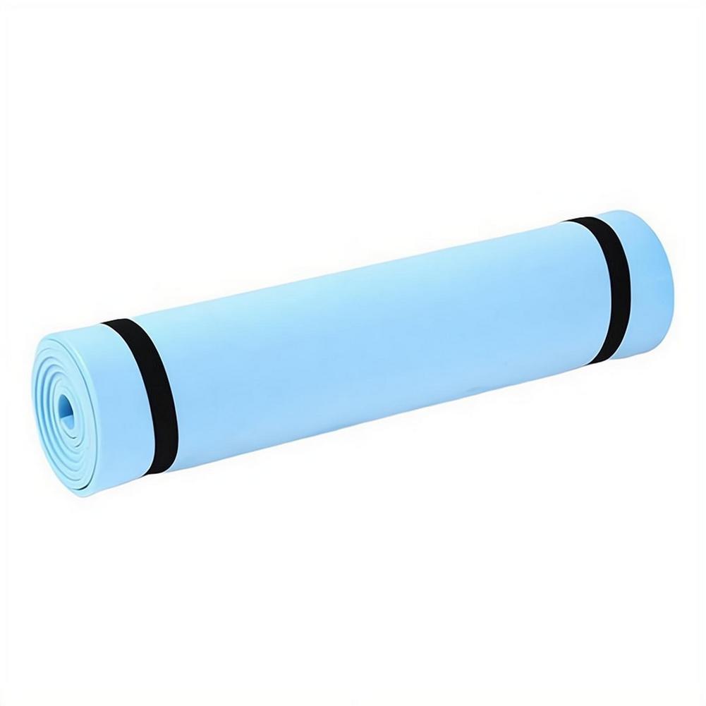 Light blue eva exercise mat with black elastic straps designed as a portable fitness and camping mat.