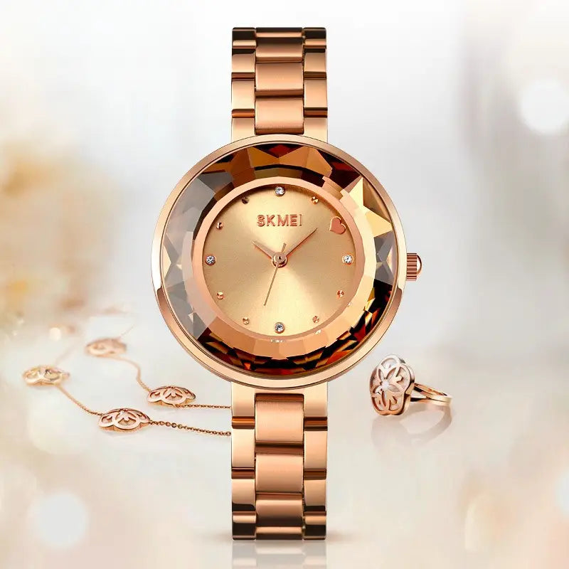 Rose gold skmei floral quartz watch with leather strap featuring a faceted crystal bezel and diamond accents on the face in a gift box.