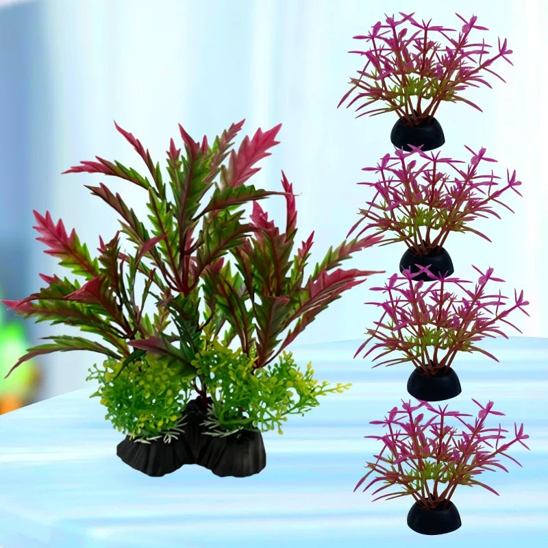 Set aus simulierten Wasserpflanzen mit leuchtend pinkem und grünem Blattwerk, montiert auf schwarzen Kunststoffsockeln, geeignet für die Aquariendekoration.