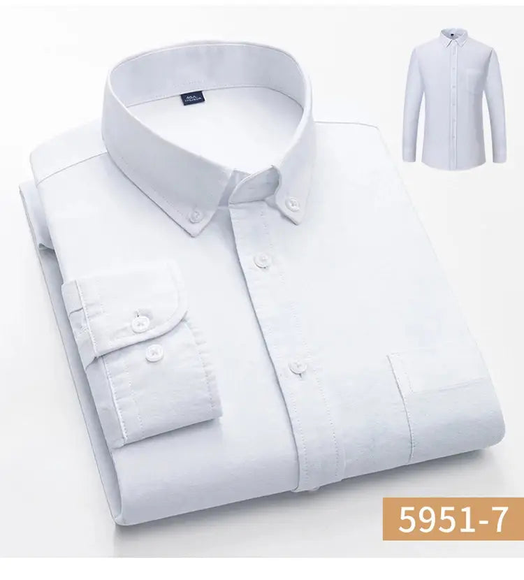 A crisp white cotton oxford slim fit dress shirt with a classic collar and neatly folded cuffs for men.