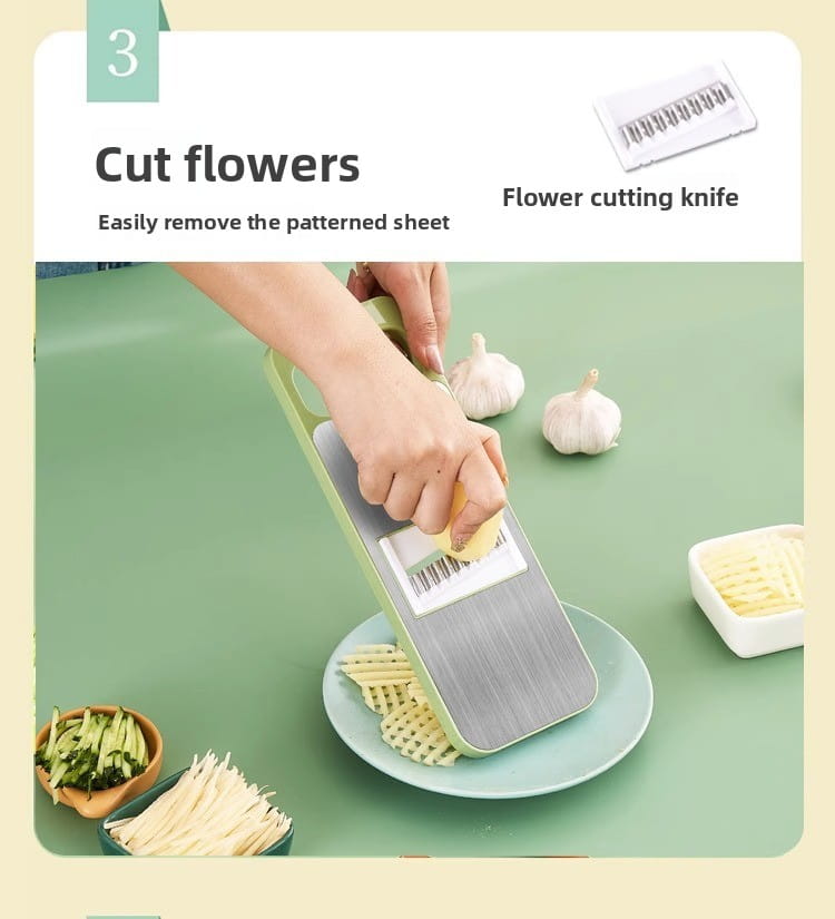 Green-handled multi-functional stainless steel vegetable slicer shredder with a patterned cutting surface and sharp blade for grating.