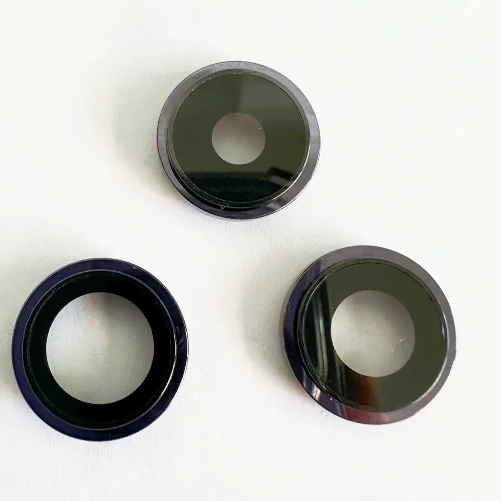 iphone 14 series camera lens glass cover with frame featuring three circular covers with glossy black centers and metallic silver rims for enhanced protection modname=ckeditor