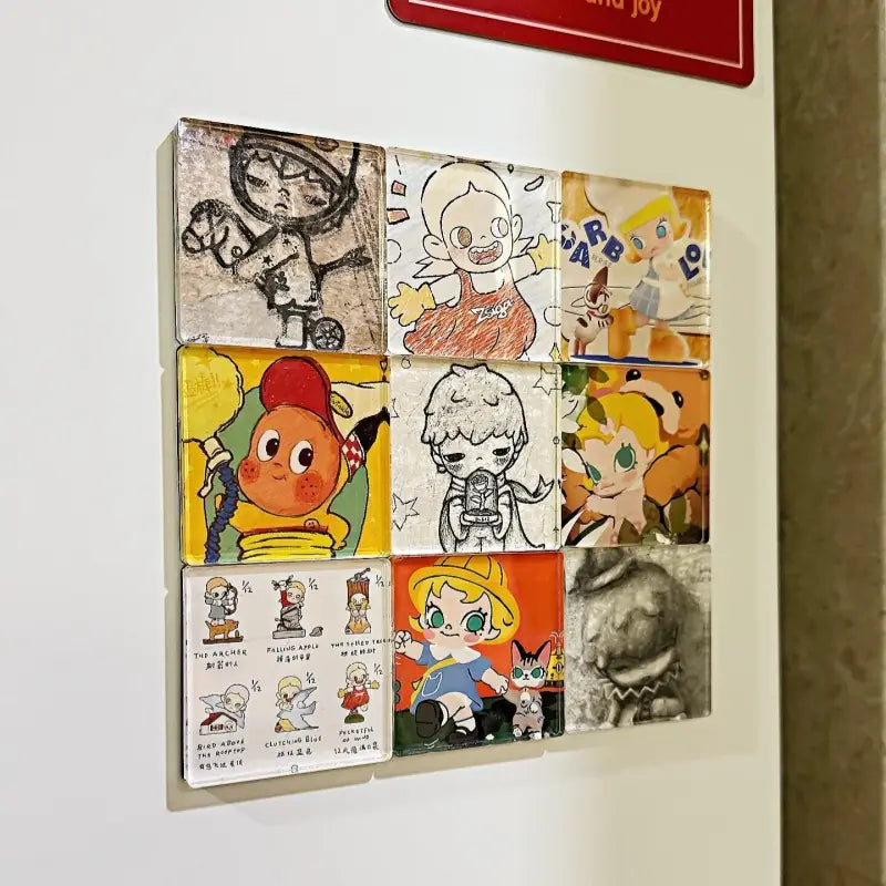 un ensemble de neuf panneaux artistiques en vinyle pop colorés représentant des figurines, présentés en grille comme des magnets de réfrigérateur personnalisés dans un kit de bricolage en acrylique