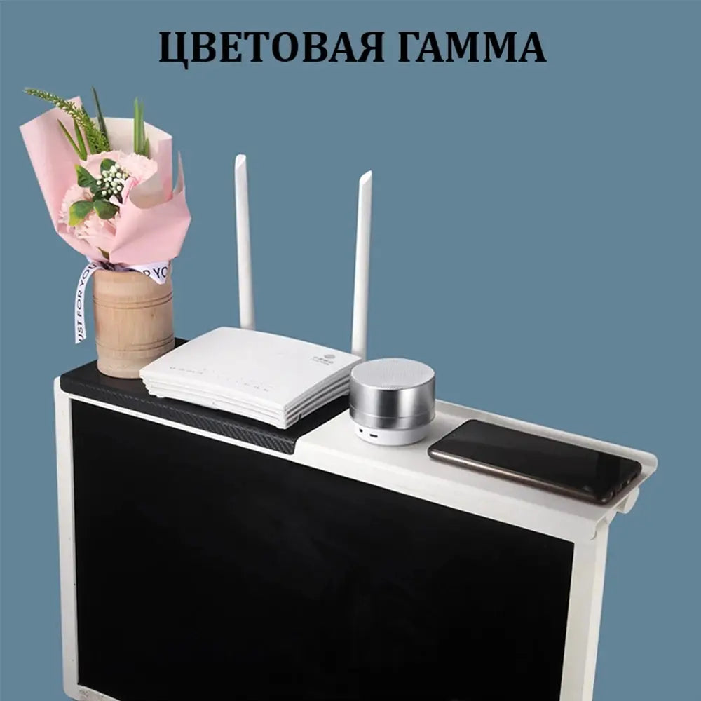 White adjustable screen top storage shelf monitor stand with black textured surface and integrated phone slot for organized workspace.