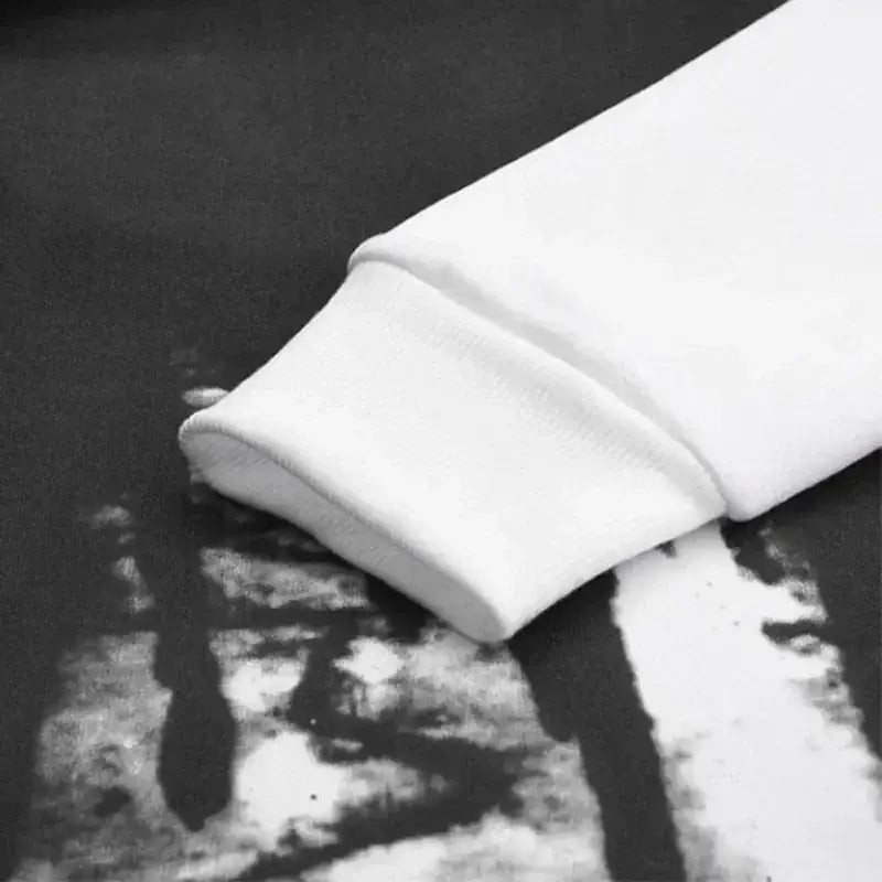 Ensemble sweat à capuche et jogging pour homme portant le numéro 23, avec une manche en coton souple blanche et un poignet côtelé.