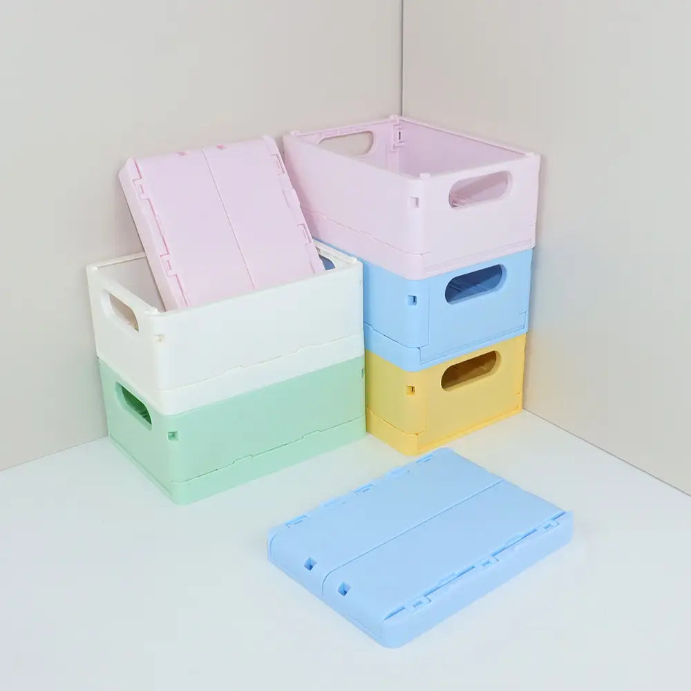 faltbare Kunststoff-Aufbewahrungsboxen in Pastellrosa, Weiß, Mintgrün, Hellblau und Gelb, ausgelegt als Desktop-Organizer und als Aufbewahrungsboxen-Körbe.