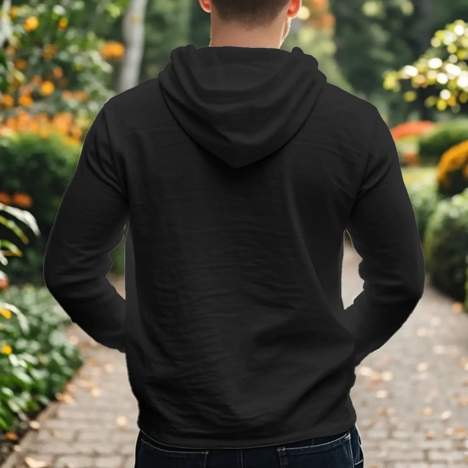 Black cotton linen hooded henley shirt for men featuring long sleeves and a relaxed fit.