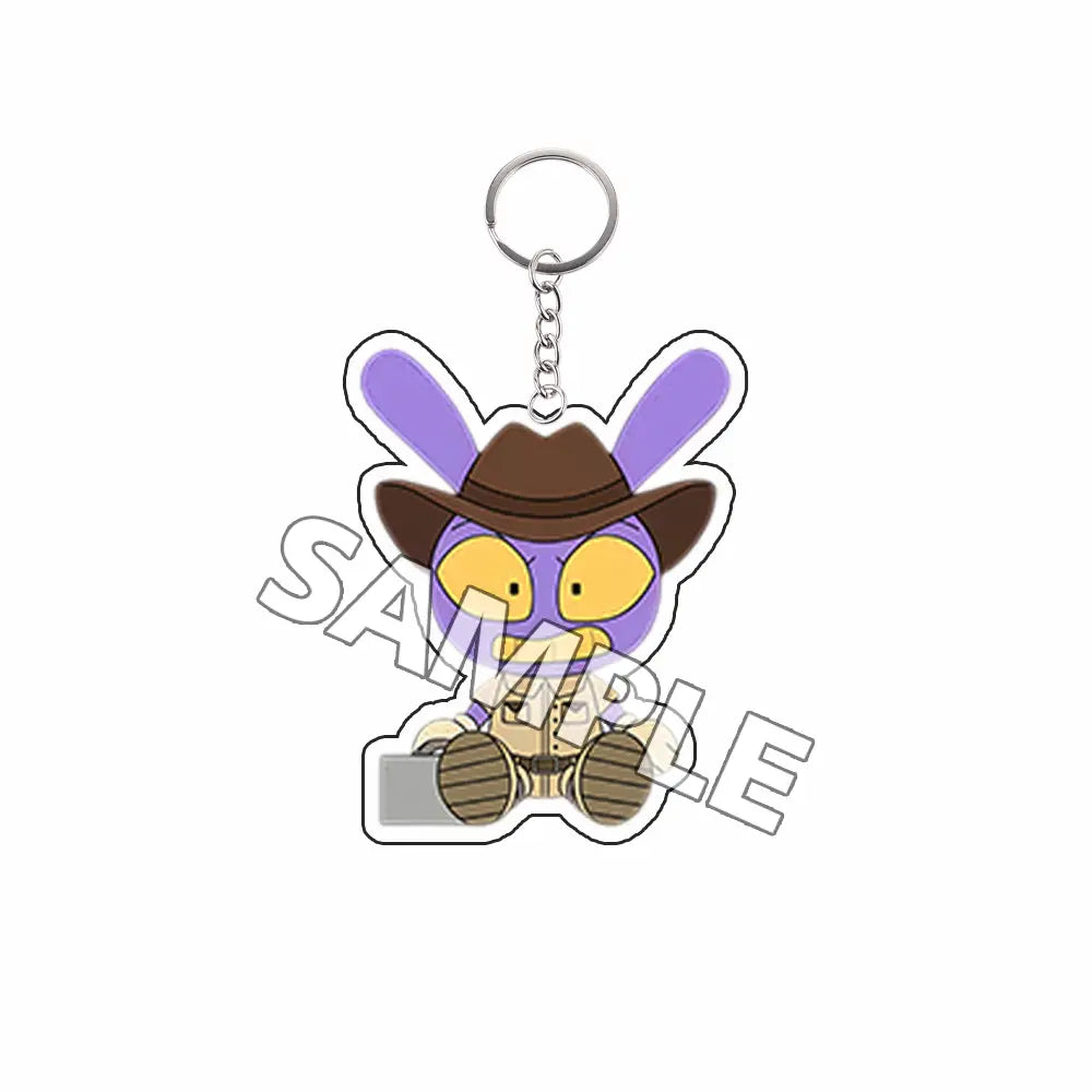 Producto terminado de llavero acrílico que presenta un personaje con forma de conejo morado con ojos amarillos, que lleva un sombrero de vaquero marrón y se encuentra sujeto a un aro metálico plateado y una cadena.