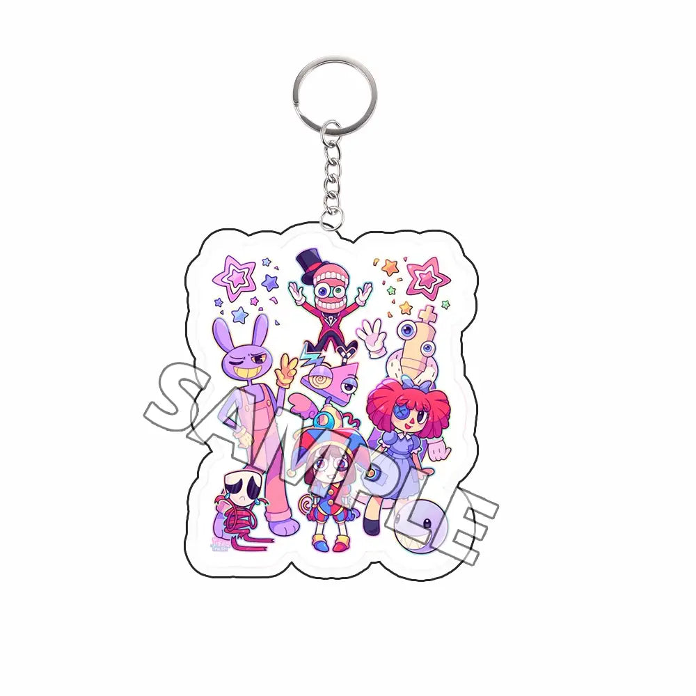 Llavero acrílico transparente de colores, con personajes caricaturescos vibrantes de rosa, morado y azul en diseños lúdicos, como producto terminado de la colección de personajes tipo Tadc.