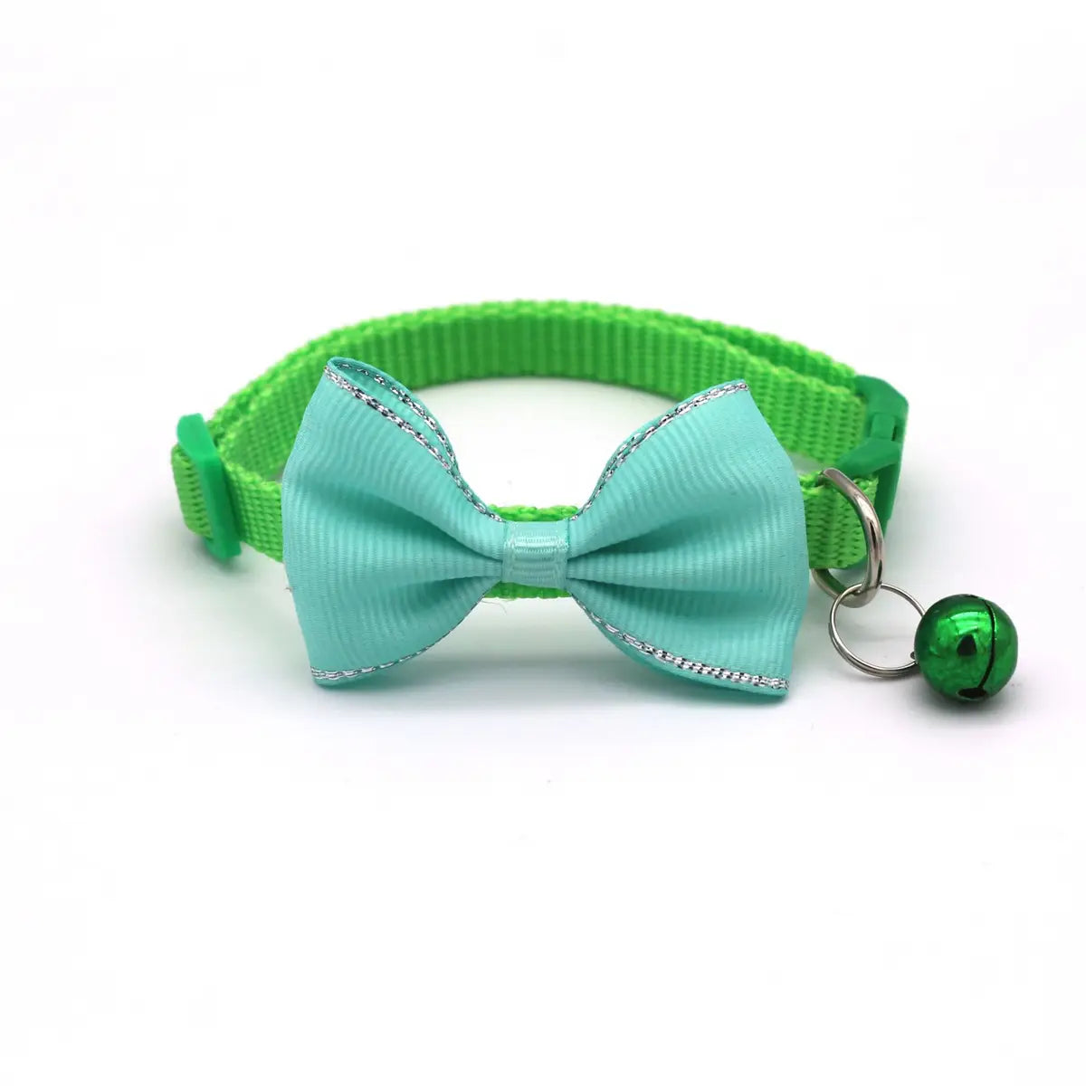 A mint green cat collar bowtie set with shiny silver trim and a matching metallic adjustable bell.